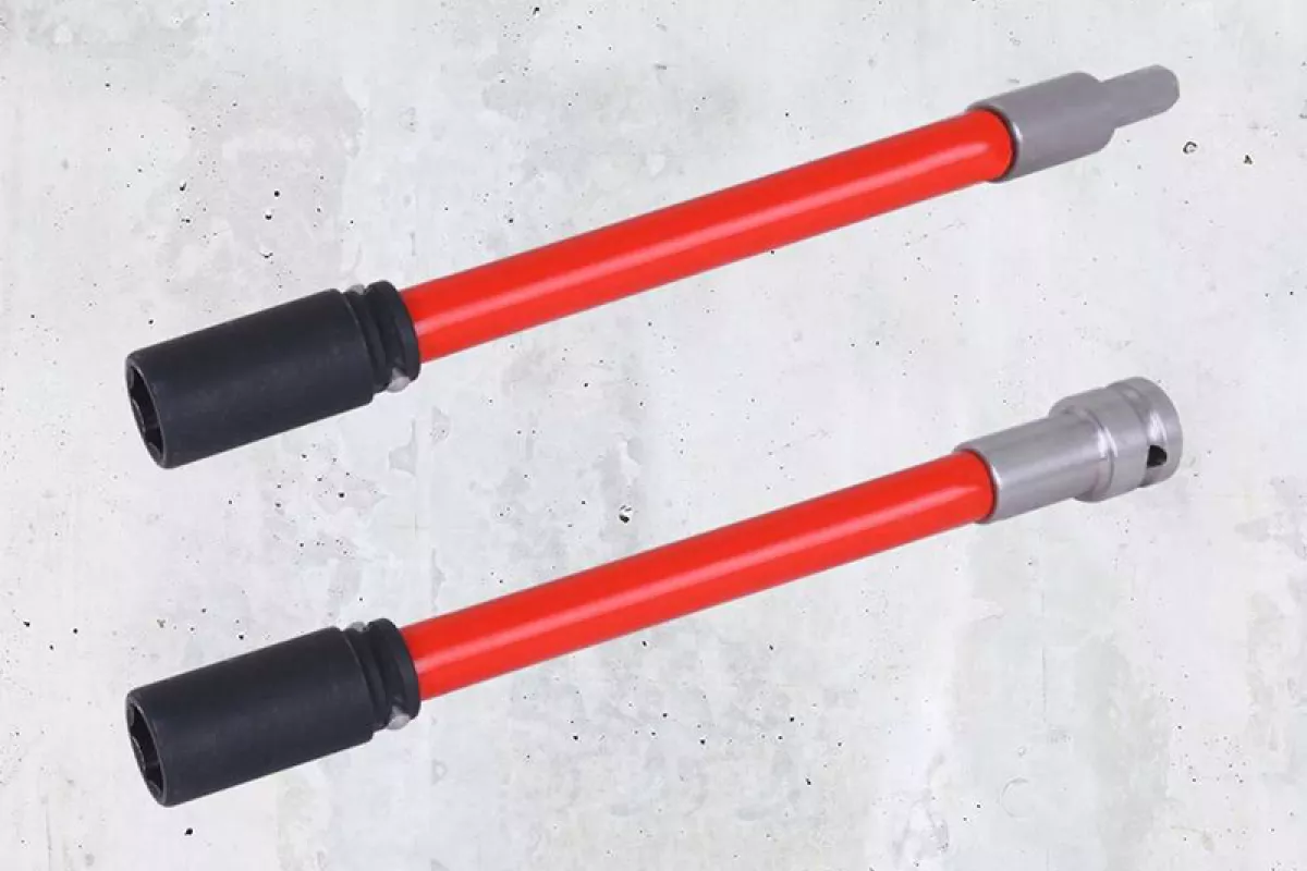 red assembly tool on concrete background