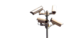 Pole-mounted cluster of five surveillance cameras facing different directions.